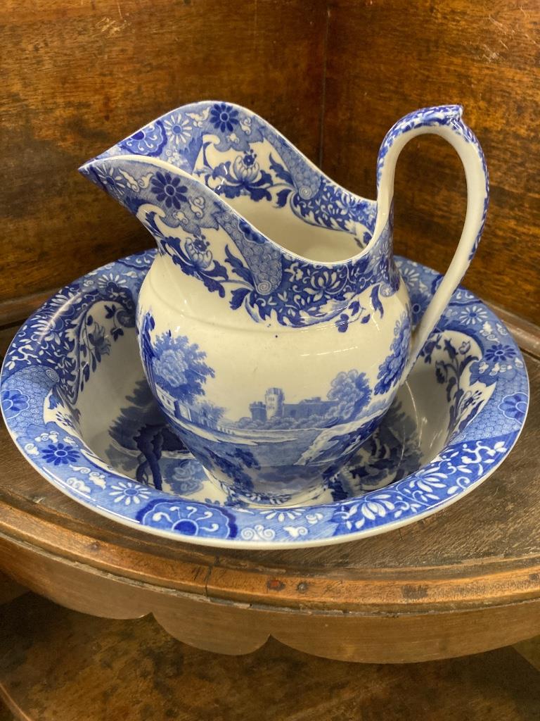 A George III corner washstand, width 62cm, depth 41cm, height 121cm together with a Spode blue and white jug and basin